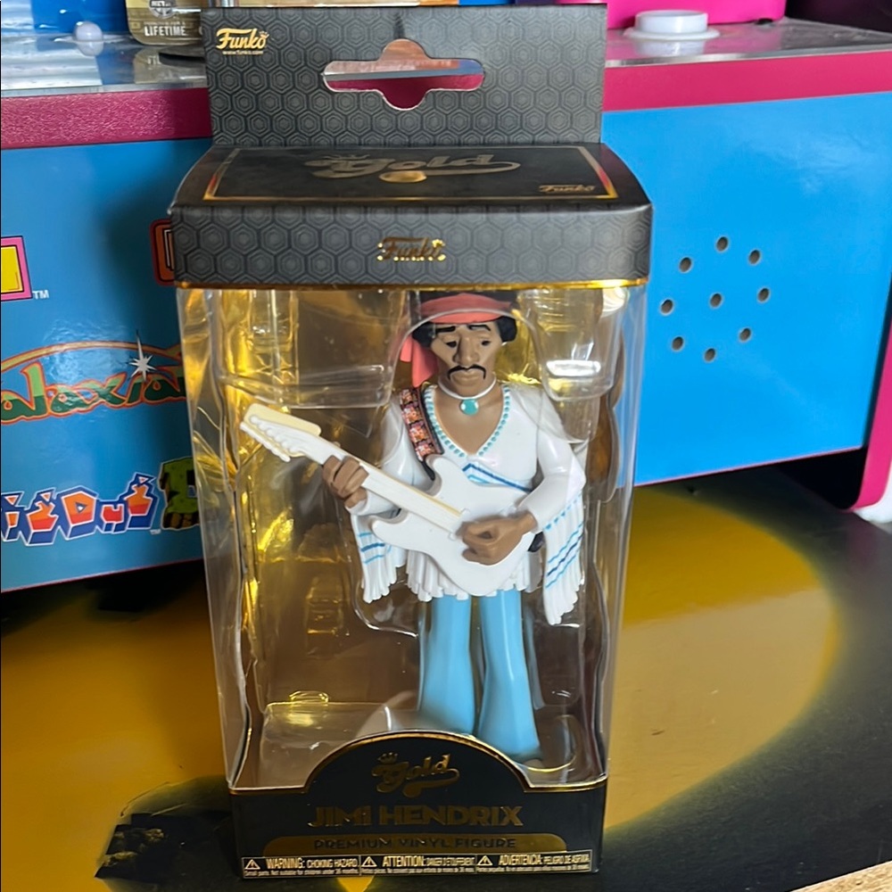 Funko Gold Jimi Hendrix Figure with Blue and White Outfit